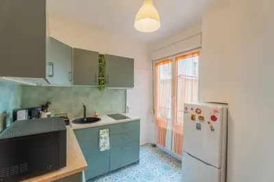 Cuisine ou kitchenette dans l'établissement Le rétro - 11ème - Bastille