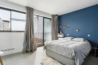 Un ou plusieurs lits dans un hébergement de l'établissement AV Experiences - Maison Belleville Luxury