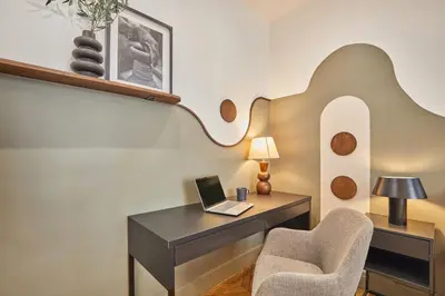 Coin salon dans l'établissement Avina - 3 chambres à Trocadéro