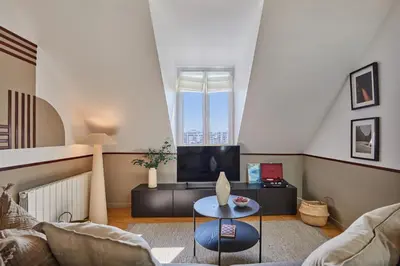 Coin salon dans l'établissement Boari - 1 chambre à Archives
