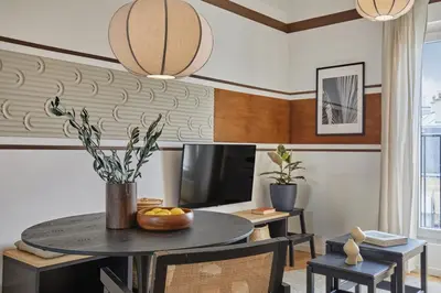 Télévision ou salle de divertissement dans l'établissement Etnia - 1 chambre à Jardin des Plantes