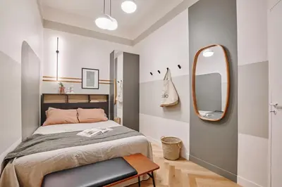 Un ou plusieurs lits dans un hébergement de l'établissement Fluma - 2 chambres et terrasse à Halles