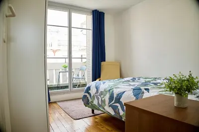 Un ou plusieurs lits dans un hébergement de l'établissement Paris Tour Eiffel