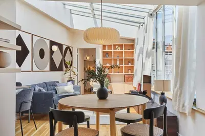 Coin salon dans l'établissement Gairo - 1 chambre à Champs-Élysées