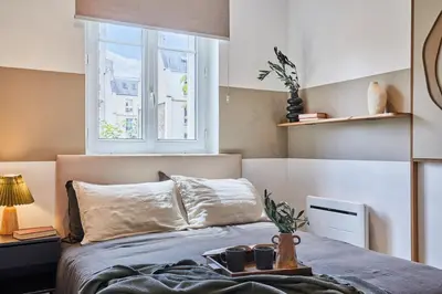 Un ou plusieurs lits dans un hébergement de l'établissement Haria - 1 chambre à Pasteur