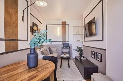 Coin salon dans l'établissement Isena - 1 chambre et balcon à École Militaire