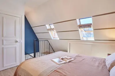 Un ou plusieurs lits dans un hébergement de l'établissement Juria - 3 chambres à Ternes