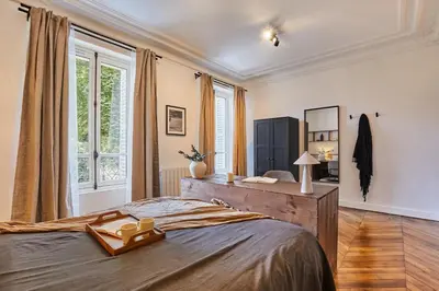 Un ou plusieurs lits dans un hébergement de l'établissement Palma - 3 chambres à Madeleine