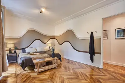 Un ou plusieurs lits dans un hébergement de l'établissement Palma - 3 chambres à Madeleine