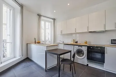 Cuisine ou kitchenette dans l'établissement Yanoa - 4 chambres à Madeleine