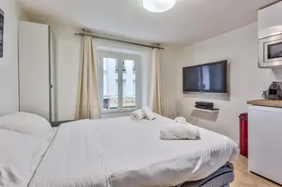 Un ou plusieurs lits dans un hébergement de l'établissement BAIL MOBILITE - Studio notre dame de Nazareth