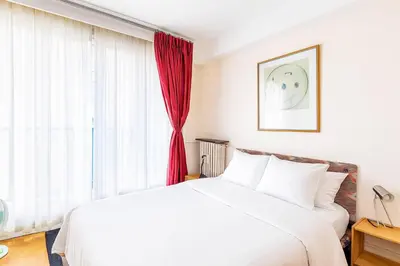 Un ou plusieurs lits dans un hébergement de l'établissement GuestReady - Amazing home near the Eiffel Tower
