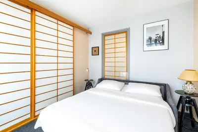Un ou plusieurs lits dans un hébergement de l'établissement GuestReady - Amazing home near the Eiffel Tower
