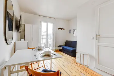 Coin salon dans l'établissement Sejour cosy a deux entre Voltaire & Marais