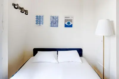Un ou plusieurs lits dans un hébergement de l'établissement Sejour cosy a deux entre Voltaire & Marais