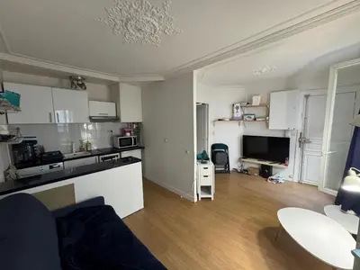 Cuisine ou kitchenette dans l'établissement 2 pièces en plein coeur de Montparnasse