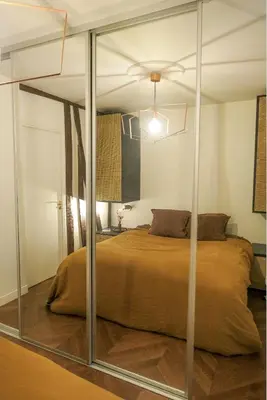 Un ou plusieurs lits dans un hébergement de l'établissement Appartement cosy au cœur du Marais