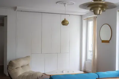 Coin salon dans l'établissement Appartement cosy au cœur du Marais