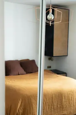 Un ou plusieurs lits dans un hébergement de l'établissement Appartement cosy au cœur du Marais