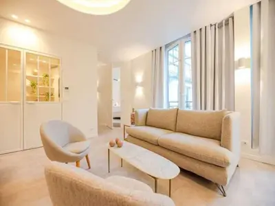 Coin salon dans l'établissement Superb Appt with AC - 2BD 6P - Madeleine Opera