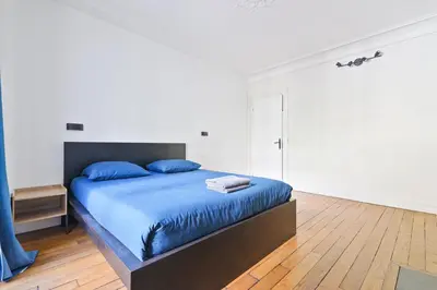 Un ou plusieurs lits dans un hébergement de l'établissement Luxurious 2 Bedroom Apartment Nation Free Netflix