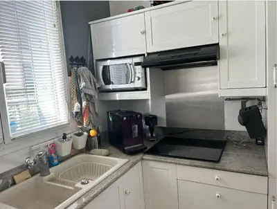 Cuisine ou kitchenette dans l'établissement Idéal pour visiter Paris