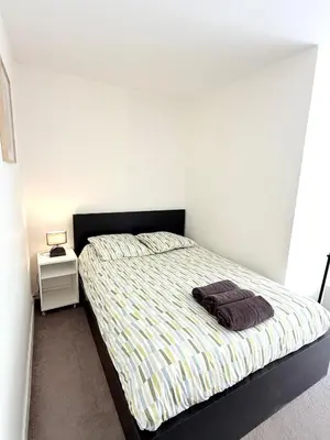 Un ou plusieurs lits dans un hébergement de l'établissement Appartement Brochant Batignolles Paris