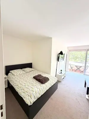 Un ou plusieurs lits dans un hébergement de l'établissement Appartement Brochant Batignolles Paris