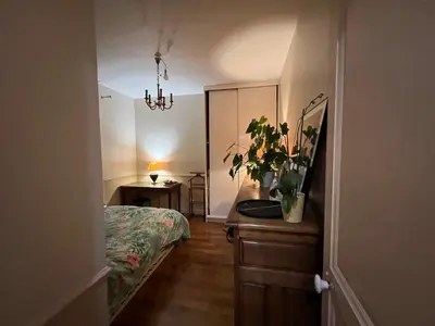 Un ou plusieurs lits dans un hébergement de l'établissement Cosy Appartement