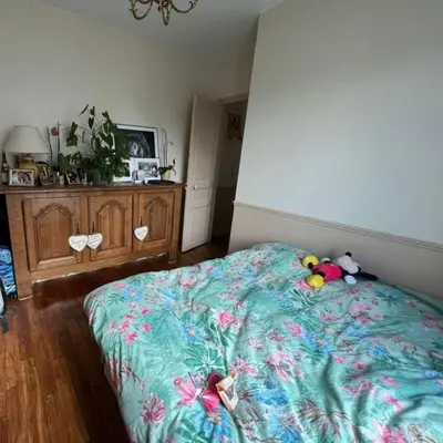 Un ou plusieurs lits dans un hébergement de l'établissement Cosy Appartement