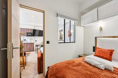 Un ou plusieurs lits dans un hébergement de l'établissement Lavie Maison 7th AC Hot Tub