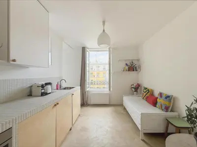 Cuisine ou kitchenette dans l'établissement Cosy And Design Nest In Paris