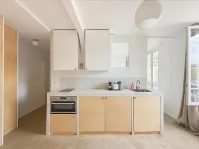 Cuisine ou kitchenette dans l'établissement Cosy And Design Nest In Paris