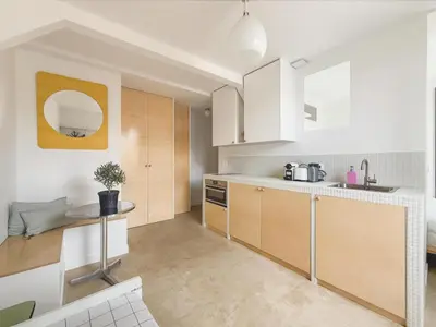 Cuisine ou kitchenette dans l'établissement Cosy And Design Nest In Paris
