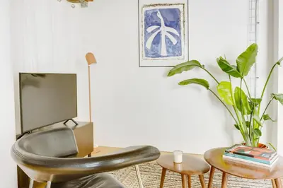 Télévision ou salle de divertissement dans l'établissement Paris Marais Bretagne Temple