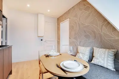 Coin salon dans l'établissement Charming apartment - 1BR-3P - Arc de Triomphe