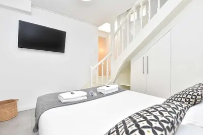 Un ou plusieurs lits dans un hébergement de l'établissement Cozy apartment - 1BR-6P - Madeleine