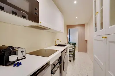 Cuisine ou kitchenette dans l'établissement Cosy Appt - 1BDR-2P - Montmartre