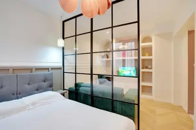 Un ou plusieurs lits dans un hébergement de l'établissement Cosy Appt - 1BDR-2P - Montmartre
