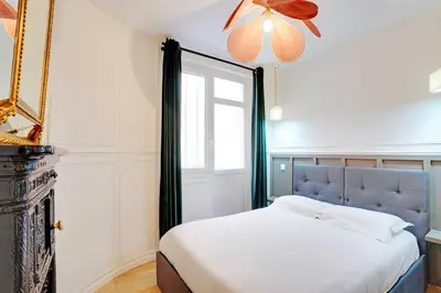 Un ou plusieurs lits dans un hébergement de l'établissement Cosy Appt - 1BDR-2P - Montmartre