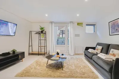 Coin salon dans l'établissement Spacious apartment-2BR-4P
