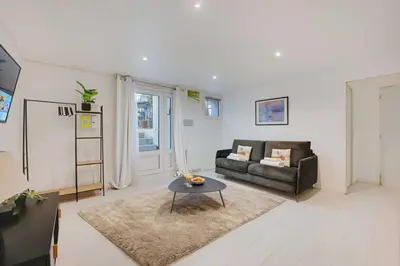 Coin salon dans l'établissement Spacious apartment-2BR-4P