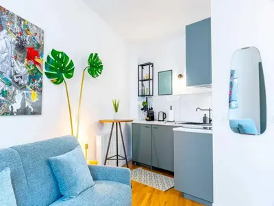 Cuisine ou kitchenette dans l'établissement Cosy Studio 2p Le Marais
