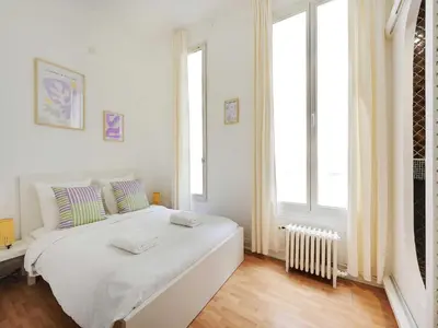 Un ou plusieurs lits dans un hébergement de l'établissement Beautiful apartment in the Marais - 3BDR 6P - PARIS