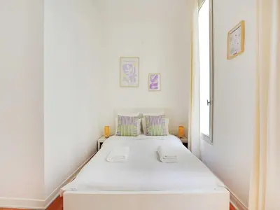 Un ou plusieurs lits dans un hébergement de l'établissement Beautiful apartment in the Marais - 3BDR 6P - PARIS