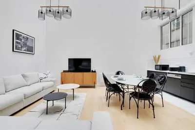 Coin salon dans l'établissement Authentique Apartment - 1BR- 2P- Voltaire