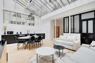 Coin salon dans l'établissement Authentique Apartment - 1BR- 2P- Voltaire