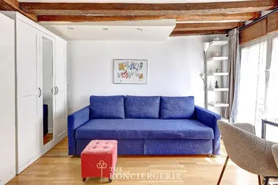 Coin salon dans l'établissement BM - Ecrin urbain dans le Marais