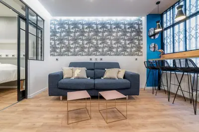 Un ou plusieurs lits dans un hébergement de l'établissement Charmant appartement paris center design Montmartre