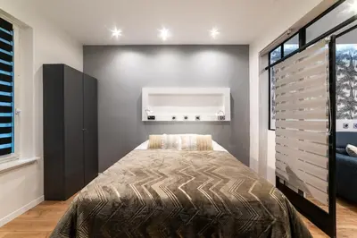 Un ou plusieurs lits dans un hébergement de l'établissement Charmant appartement paris center design Montmartre